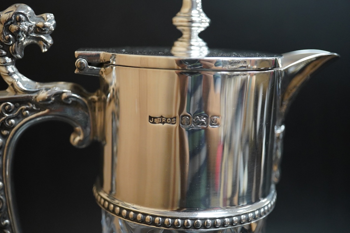 An Elizabeth II silver mounted cut glass claret jug, by J. Bros, Sheffield, 1978, height 28.5cm.